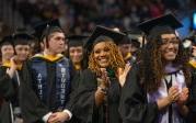 Students could not contain their excitement as they walk off the stage. Photo Nicholas Clark/ODU